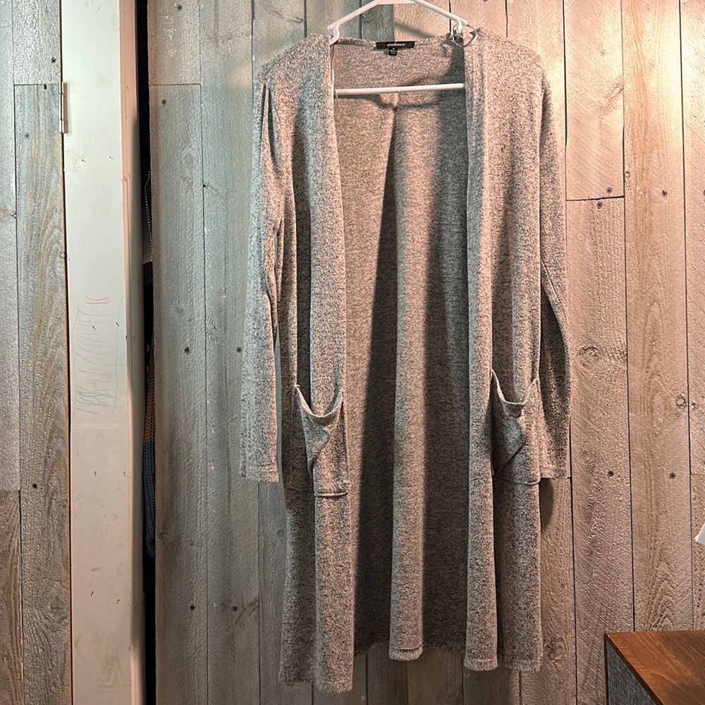 Light gray cardigan worn once size Small. No flaws.